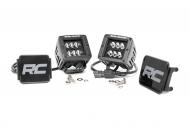 COMMAND THE DARK with Rough Country's affordable set of Black-Series 2-inch Square Cree LED Lights. This all-inclusive kit features everything you need to get going while the compact size makes it perfect for adorning a bumper, hood, roof, or anywhere you can imagine. The black panel design offers jaw-dropping good looks that blend perfectly with any vehicle using black accents like grilles, wheels, bull bars or steps! See the trails at any time of night with 36 watts and 2880 lumens of LED Lighting power. These all-weather lights feature a durable, die-cast aluminum housing and include a premium flat-wound, braided wiring harness with toggle switch and in-line fuse along with a pre-assembled low-profile mounting bracket! Includes Rough Country’s 3-year Warranty. FREE SHIPPING

FEATURES
2880 lumens
36 watts
30 degree spot beam
Each light contains 6, 3 watt high intensity Cree LEDs
Black panel design
IP67 Waterproof rating
Durable die cast aluminum housing
Moisture Breather technology reduces moisture build-up behind the lends
Includes premium, flat-wound wiring harness with on/off switch
Sold in pairs
3 year warranty
(2) 2-inch LED square light
Wiring harness
On/Off switch
Hardware